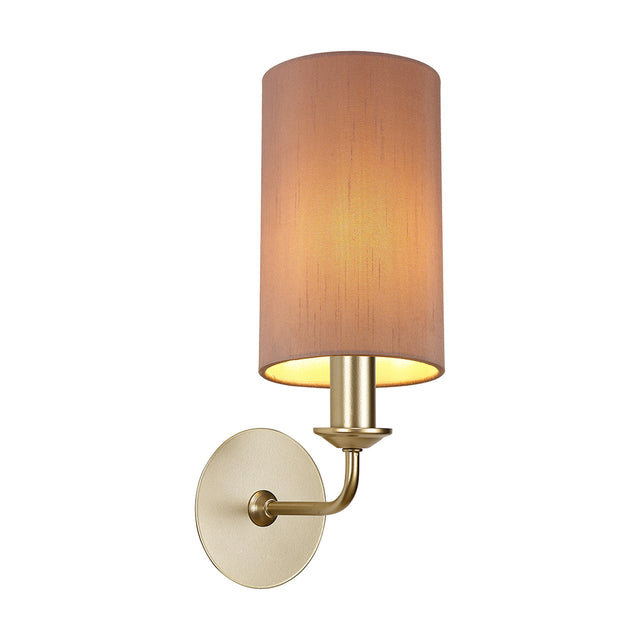 Banyan E14 wall light with a cylindrical taupe fabric shade and gold-toned lining, champagne gold curved arm and round backplate, on a plain white background.