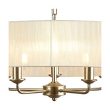 Banyan 5 Light E14 Pendant Light, close-up of champagne gold arms and E14 sockets beneath a 60cm cream organza drum shade, plain white background.