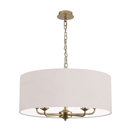 Banyan 5-light pendant with champagne gold arms and a wide 60cm nude beige drum shade, suspended from a matching chain, shown on a plain white background.