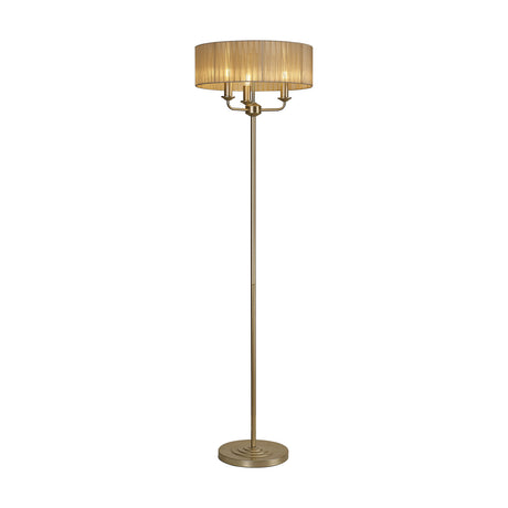 Banyan 3 Light E14 Floor Lamp with slim champagne gold frame, round base, and a 45cm soft bronze fabric drum shade over three candle lights, on a plain white background.