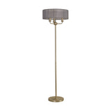 Banyan 3 Light E14 Floor Lamp with a 45cm grey organza drum shade on a slim champagne gold column and stepped round base, shown on a plain white background.