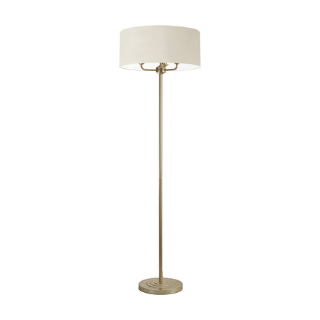 Banyan 3 Light E14 floor lamp with slim champagne gold stem, round base, and 50cm ivory pearl drum shade, shown on a plain white background.