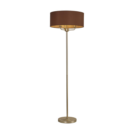 Banyan 3 Light E14 floor lamp with a 50cm drum shade in raw cocoa fabric on a champagne gold stem and round base, shown against a plain white background.