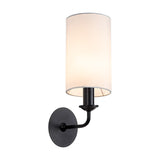 Banyan E14 wall light with a cylindrical white faux silk shade on a matt black arm and round backplate, shown on a plain white background.