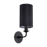 Banyan E14 wall light, 35.5cm high, with a black cylindrical faux silk shade and curved matt black arm on a round wall plate, shown on a plain white background.