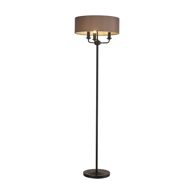 Banyan 3 Light E14 floor lamp with slim matt black stem and round base, featuring a 45cm grey drum shade with white inner lining over three candle lights, on a plain white background.