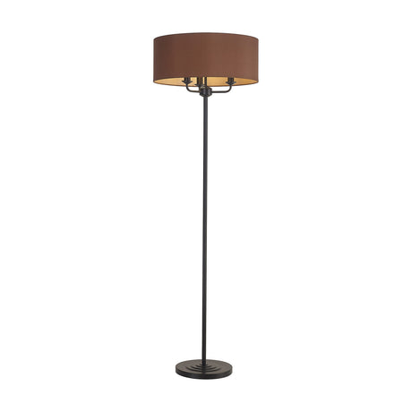 Banyan 3 Light E14 floor lamp with matt black frame and slim pole, wide 50cm drum shade in raw cocoa fabric with bronze lining, on a plain white background.