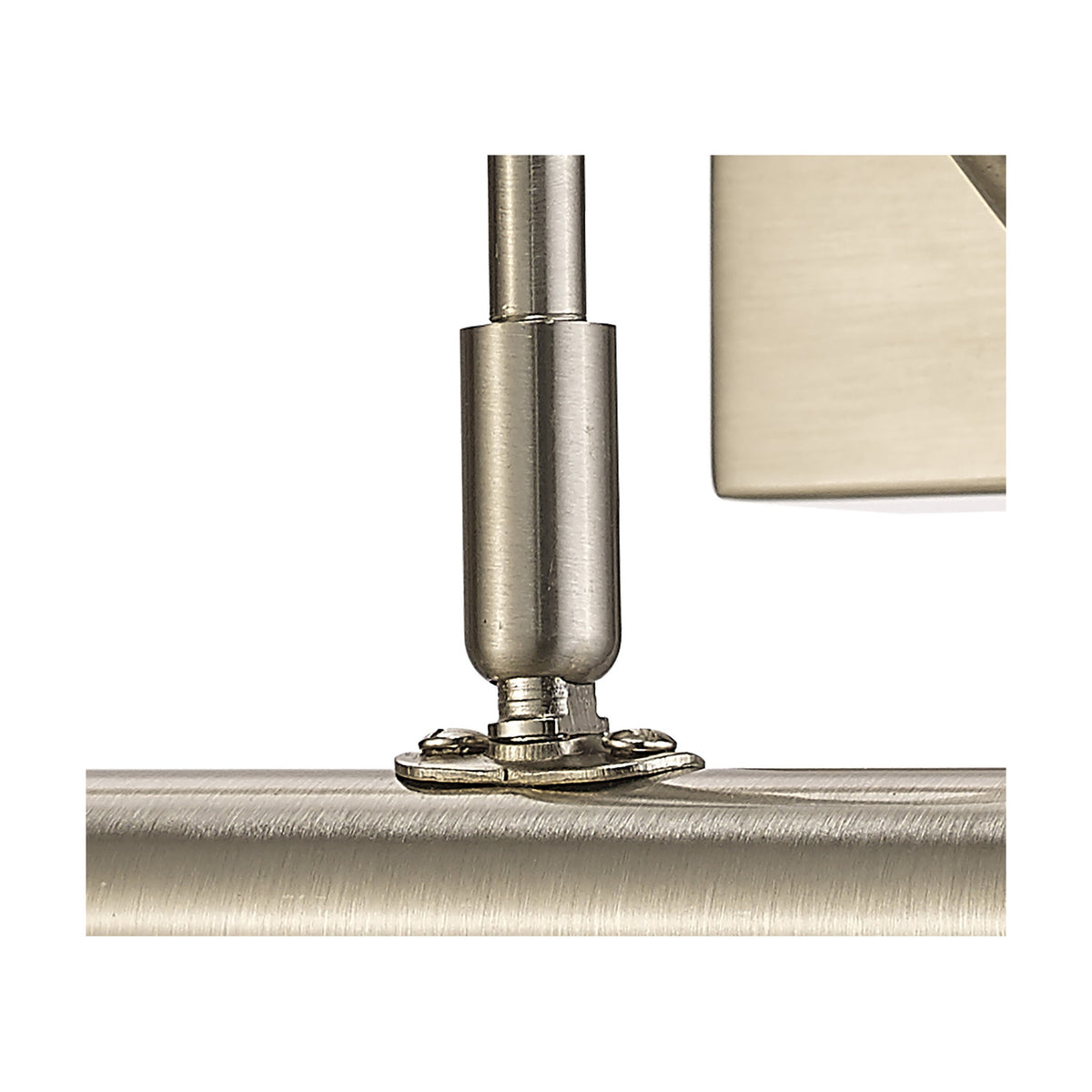Close-up of the Abacus 2 Light Picture Light's satin nickel mounting arm and base plate fixed onto a brushed metal picture frame edge, shown against a white background.