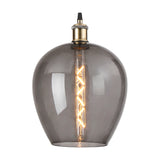 Cawdor E27 wine glass pendant light with a smoke-tinted 25cm glass shade, antique brass fitting, and black detailing, shown lit against a plain white background.