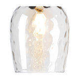 Close-up of the Cawdor wall light's clear dimpled glass shade in a wine-glass shape, showing a lit filament E27 bulb and chrome fitting details.