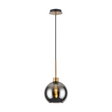 Lori Single Pendant Light with a 12cm smoke-tinted glass globe on a slender antique gold suspension rod and black ceiling rose, shown against a plain white background.