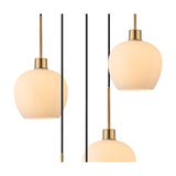 Close-up of the Lori pendant light showing three opal glass globe shades on antique gold fittings and cords, set against a white background.