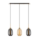 Lori 3 Light Pendant on an 85cm antique gold bar, with three elongated glass shades in amber and smoke tones, each on a slim gold suspension against a plain white background.