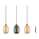 Lori 4 Light Pendant with slim curved amber and smoke glass shades on antique gold cords and fittings, shown against a plain white background.