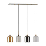 4-light pendant with a slim black bar and antique gold fittings, featuring amber, clear, smoke, and opal glass cylinder shades on a plain white background.