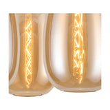 Close-up of the Lori 3 Light E27 Amber Glass Ceiling Light showing curved amber glass shades with visible filament bulbs against an antique gold fitting.