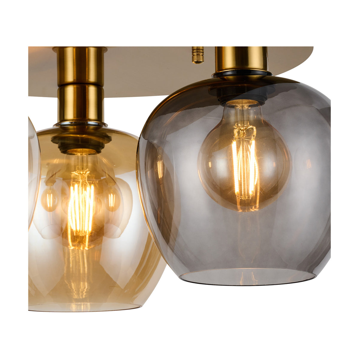 Close-up of the Lori 3 Light Flush Light in antique gold, showing amber and smoke glass wine-shaped shades with visible filament bulbs against a plain background.