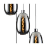 Close-up of the Lori E27 pendant light showing chrome trapezium glass shades with visible filament bulbs and polished chrome suspension fittings against a white background.