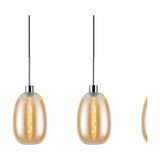 Lori 4 Light Trapezium Pendant Light in amber glass with polished chrome fittings, showing individually suspended trapezium shades with visible filament bulbs against a plain white background.