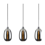 Lori pendant light showing three of four trapezium-shaped chrome glass shades on individual cords with visible filament bulbs, polished chrome fittings, plain white background.