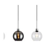 Lori pendant lights with round smoke and clear glass globe shades on black cables with polished chrome fittings, each showing a visible bulb, on a white background.