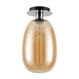 Lori E27 flush ceiling light with an amber glass shade in a curved trapezium shape, mounted on a 15cm polished chrome and black ceiling plate, shown with visible filament bulb on a white background.