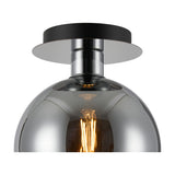 Close-up of the Lori E27 Open Mouth Flush Ceiling Light in polished chrome, showing a round mirrored glass globe with a black and chrome ceiling plate against a white background.
