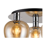 Close-up of the Lori 3 Light E27 flush ceiling light, showing amber glass shades on polished chrome fittings against a black round ceiling plate, on a white background.