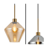 Single amber diamond-cut glass shade pendant light with satin brass fitting on a black cable, shown against a plain white background, E27 bulb visible inside.