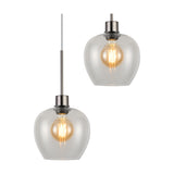 Lori pendant light with two clear wine glass shaped shades on satin nickel fittings, each fitted with an exposed amber-glow filament bulb, shown on a white background.