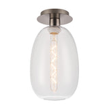 Lori flush ceiling light with a clear glass trapezium shade and satin nickel ceiling plate, exposed E27 filament bulb, shown on a plain white background.