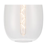 Close-up of the Lori Clear Trapezium Flush Ceiling Light 15cm in satin nickel, showing the curved clear glass shade with an exposed E27 spiral filament bulb on a plain white background.