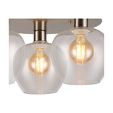 Close-up of the Lori 3 Light Flush Ceiling Light, showing wine glass-shaped clear glass shades on satin nickel fittings with visible E27 filament bulbs.