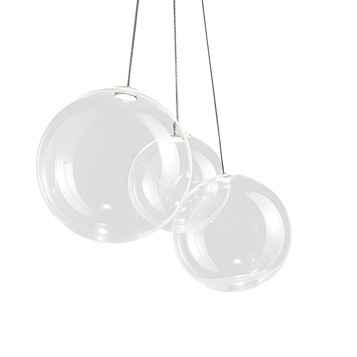 Niori Diverso 3 Light LED Cluster Pendant with three clear blown-glass globes in varying sizes hanging from slim cables against a white background.