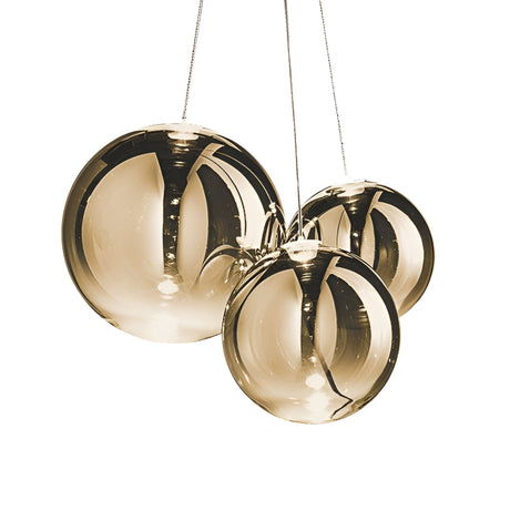 The Diverso LED Pendant Light - Gold features three modern glass globes with metallic reflections, suspended on slim wires against a white background, highlighting its elegant gold finish and energy-efficient LED design.