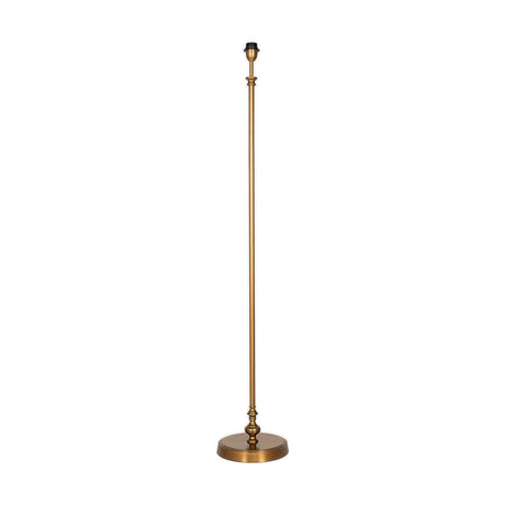 Ehadi Antique Floor Lamp Base in antique brass, with a stepped round foot, turned knops, and a tall slender column, shown on a plain white background.