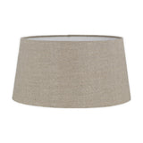 Embaata Large Linen Lampshade in natural, a tapered drum shade with pale lining and visible flax texture, shown on a plain white background.