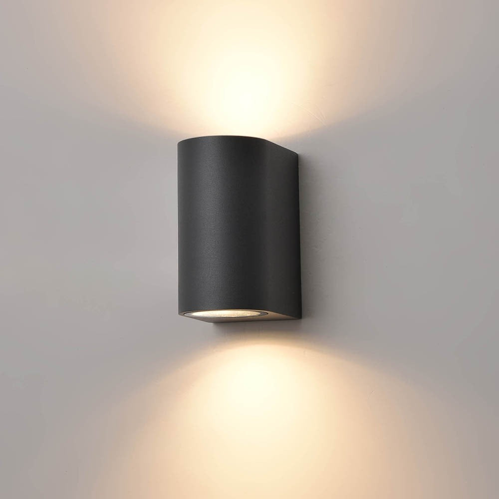 Aura 2 light exterior wall light in dark grey finish, shown on a dark background