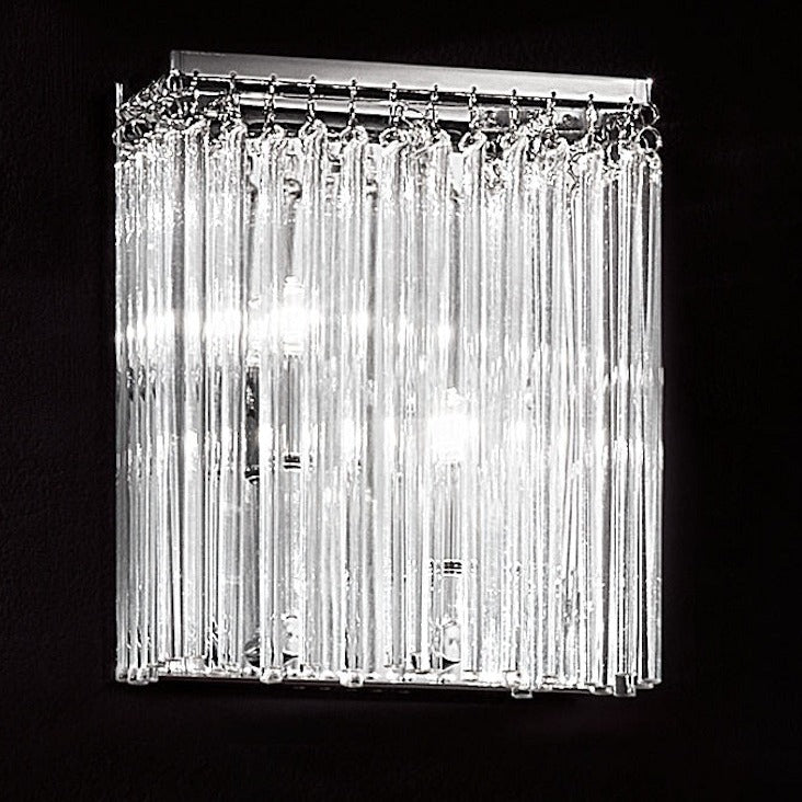 Carillon 2 light wall light in chrome finish, shown on a dark background