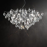 Wisteria 13 light chandelier in chrome finish, shown on a dark background
