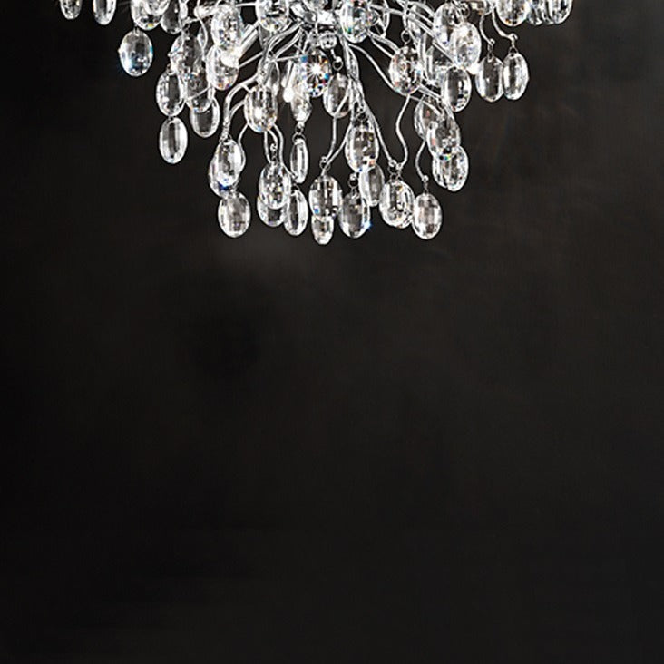 Wisteria 8 light ceiling light in chrome finish, shown on a dark background
