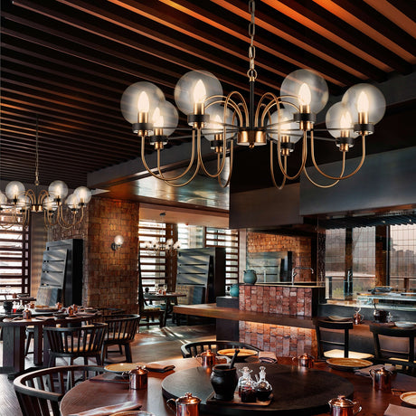 Equinox wall light in black and gold finish, shown in a room setting