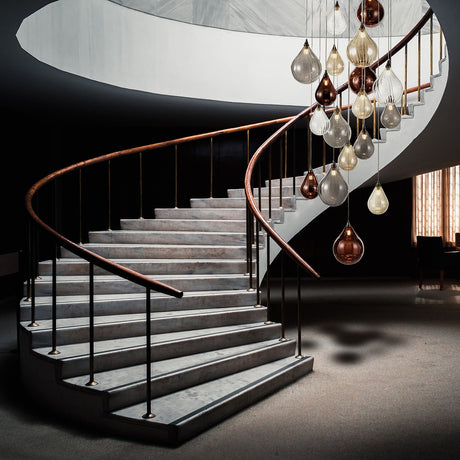 Perry 18 light chandelier in satin nickel finish, shown in a room setting