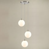 Galaxy 3 light pendant light in satin nickel finish, shown on a dark background
