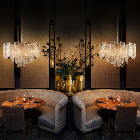 Icicle 10 light chandelier in brass finish, shown in a room setting