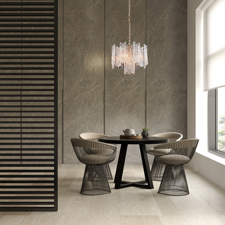 Icicle 5 light pendant light in brass finish, shown in a room setting