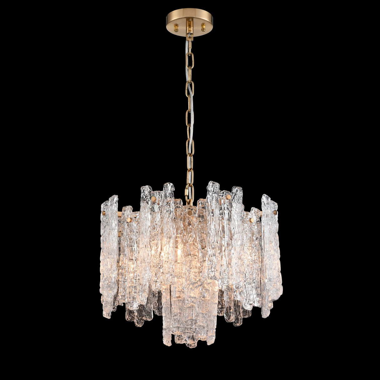 Icicle 5 light pendant light in brass finish, shown on a dark background