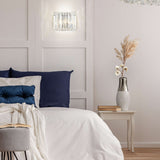 Diva 3 light wall light in chrome finish, shown in a room setting