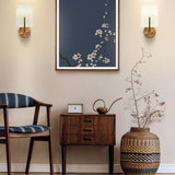 Clifton wall light in brass finish, shown in a room setting