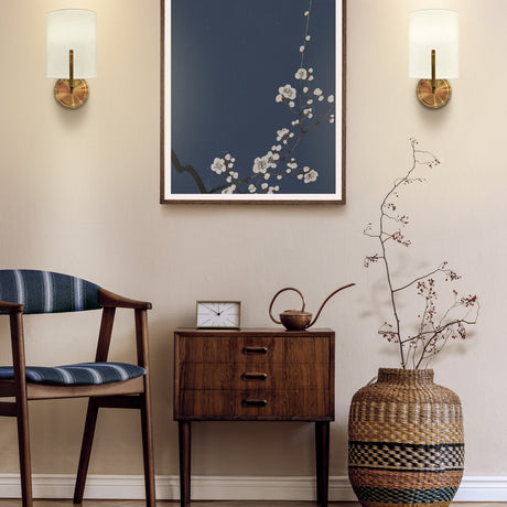 Clifton wall light in brass finish, shown in a room setting